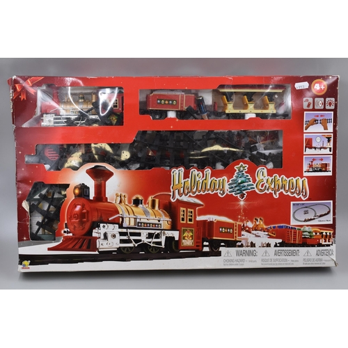 731 - Boxed Battery Operated Holiday Express Christmas Train Set seems to be complete untested item