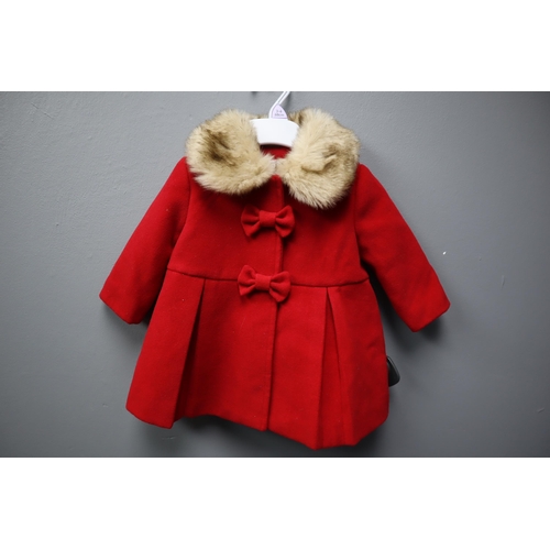 554 - Brand New Baby's Winter Christmas Coat ages 3-6