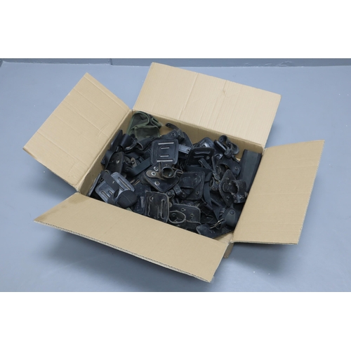 787 - Large Bag of Military items to include Baton Holders, Mixed Holsters, Torch Holders and more