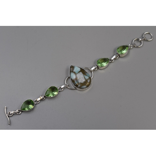 30 - A 925. Silver Copper Larimar and Tsavorite Stoned Bracelet