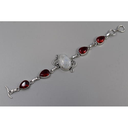 33 - A 925. Silver Rainbow Moonstone and Garnet Stoned Bracelet