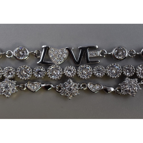 47 - Three New Silver 925 Diamante Bracelets. Includes Love Design and Star Design