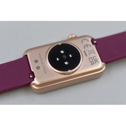 143 - Ladies multi-function smart watch in rose gold with purple strap. Brand new, boxed with and instruct... 