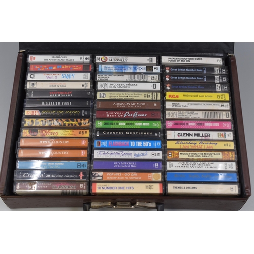 Case Containing a Large Selection of Cassette Tapes. Includes Status