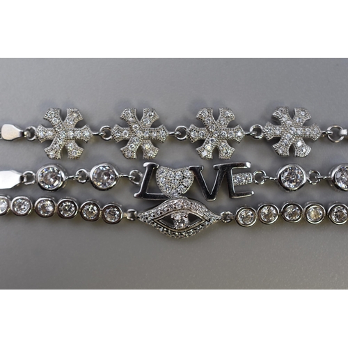 54 - Three Silver 925 Diamante Bracelets, includes Evil Eye Design and Snowflake Design
