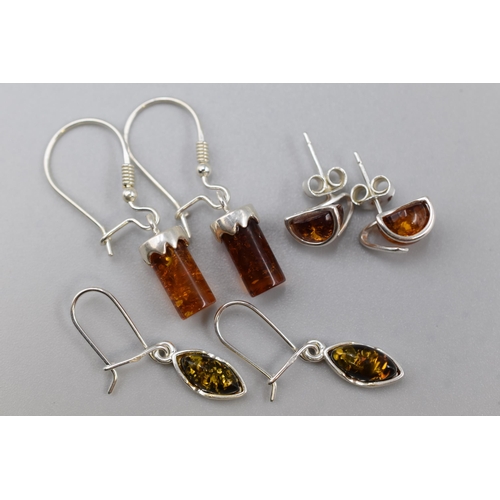 62 - Three Pairs of Silver 925 Amber Stoned Earrings