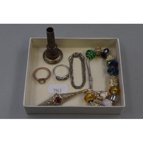 79 - A Mixed To Include Boosey & Hawkes Mouthpiece, 'Duna' Ring, Charm Bracelet, Bar Brooch, And More