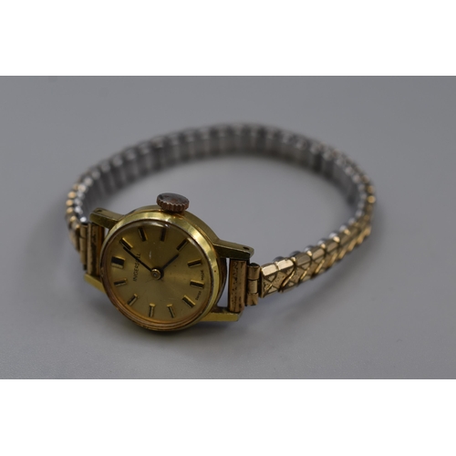 113 - A Ladies Ingersoll Gold Tone Mechanical Watch