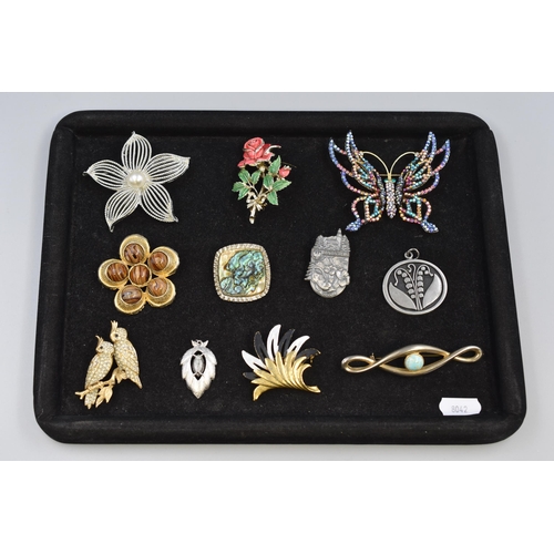 117 - Selection of 11 Named Pendants and Brooches including Exquisite, R Tennesmed and More