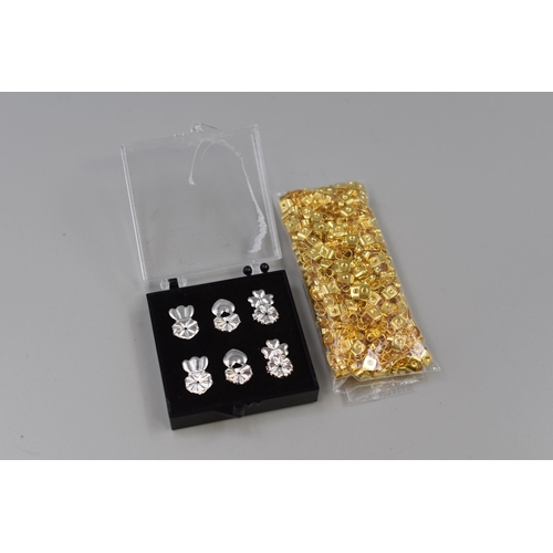 119 - 400 Gold Tone Earring Backs and Six Silver Tone Earring Back Supports