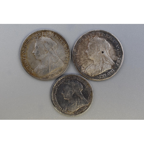 205 - Three Victorian Silver UK Coins. Includes 1897 Sixpence, 1899 Sixpence, And 1894 Threepence