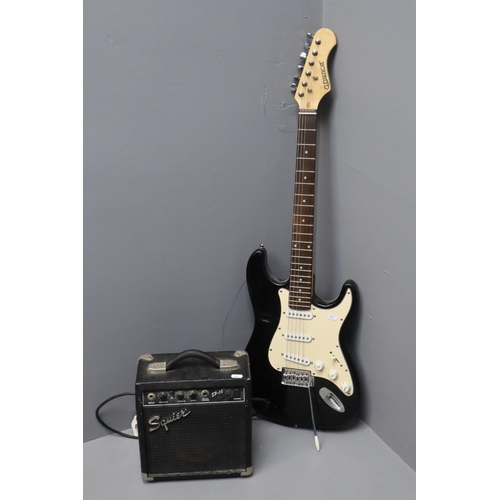 532 - Two items to include Elevation Electric Guitar (untested) and a Squier Amp (powers on)