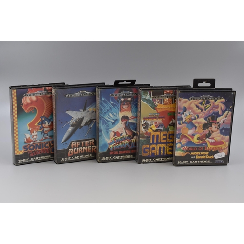 239 - Five Empty Sega Mega Drive Game Cases. Includes Mickey Mouse World Of Illusion, Mega Games I, Street... 