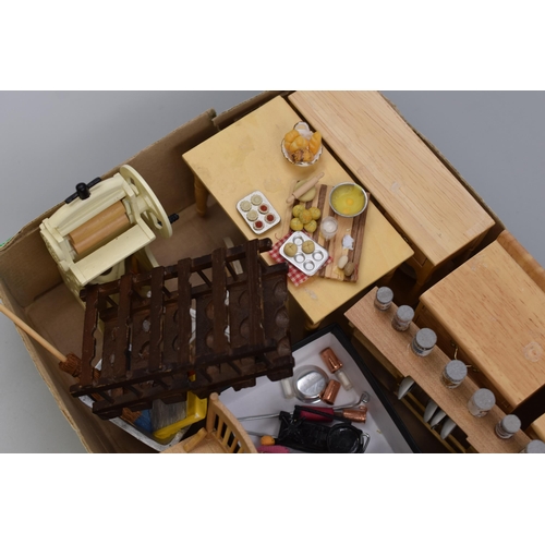 557 - A Selection of Dolls House Kitchen Furniture and Accessories. Includes Kitchen Table With Food Items... 