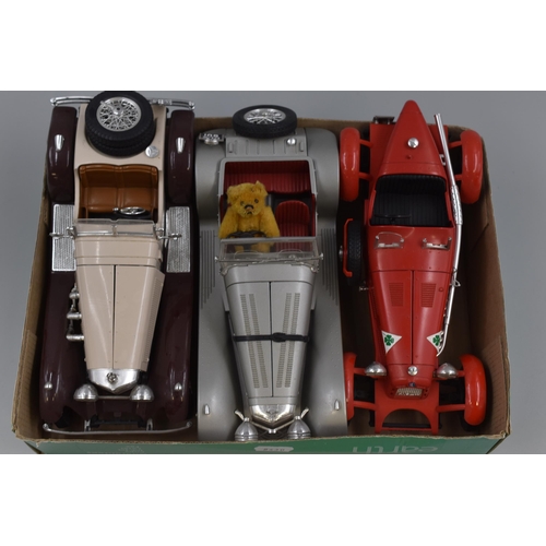 558 - Three 1/18 scale die cast vintage sports cars to include 1934 Alpha Romeo 2300 Monza, 1937 Jaguar SS... 