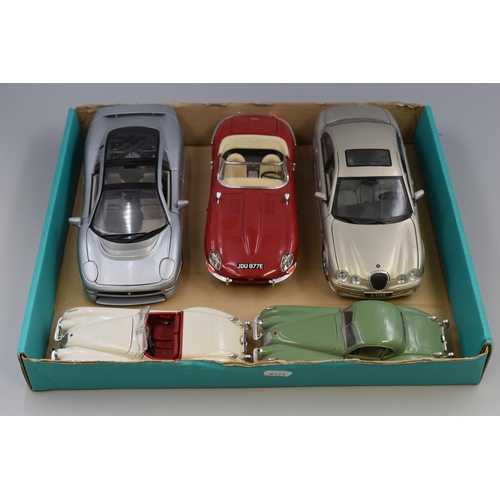 561 - Selection of die cast Jaguar cars to include, 1/18 scale, 1961 E Type in red and 1/24 scale 1948 XK1... 