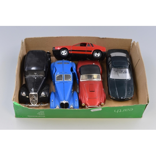 572 - Selection of five die cast model cars largest 7