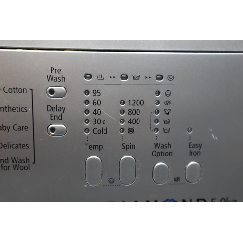 660 - Samsung diamond 5kg washing machine in silver. model number: wf8502ngs , Power on when tested.