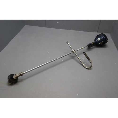 676 - 24 cc petrol brush cutter, has compression when tested