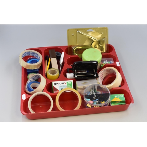 701 - Selection of stationary items to include tape, staplers, hole punch and more