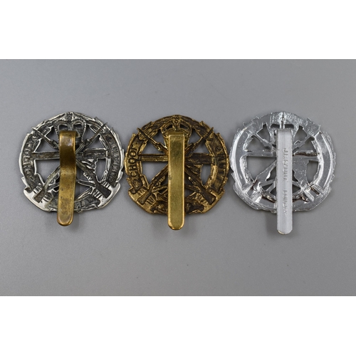 280 - Three Small Arms School Cap Badges