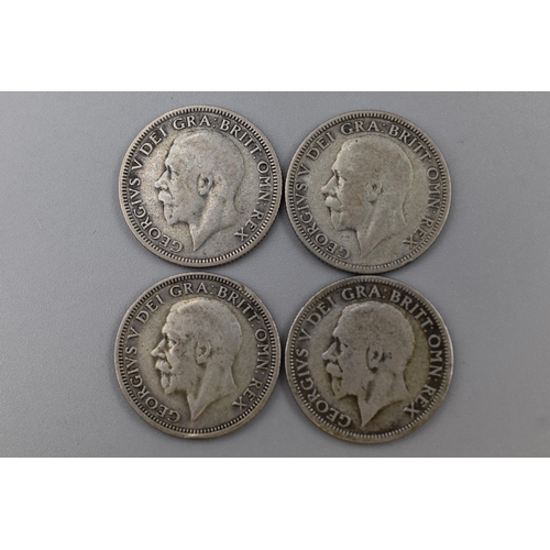 102 - Four George V Silver Shillings (1928, 1929, 1932, & 1933)