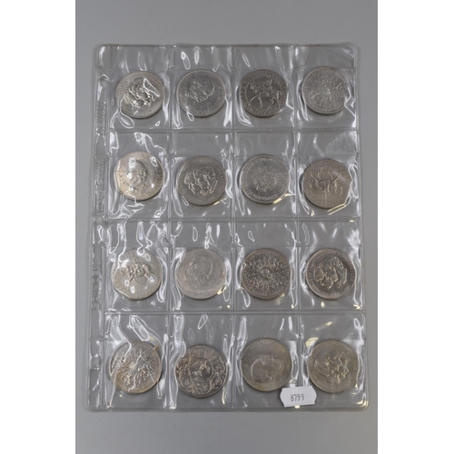 128 - Selection of 32 Mixed Crowns held within two Clear Displays