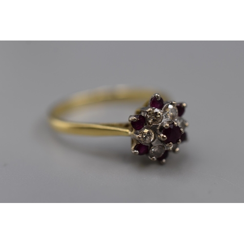 11 - A Hallmarked London 18ct Gold Diamond and Ruby Cluster Ring, With Presentation Box. 3.69g (Size R)