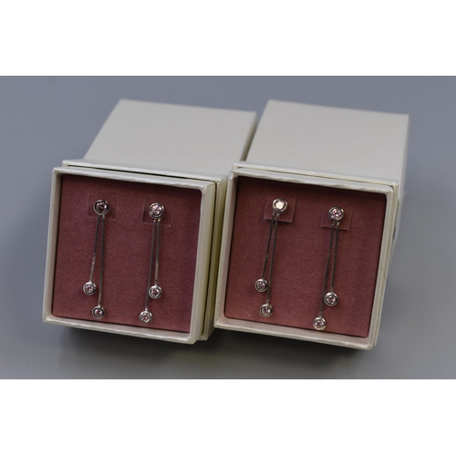 26 - Two Pairs of Silver 925 Oasis Pink Stoned Drop Earrings. Complete in Packaging