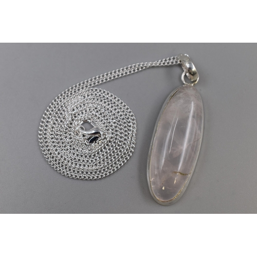 37 - A 925. Silver Rose Quartz Stoned Pendant on 30