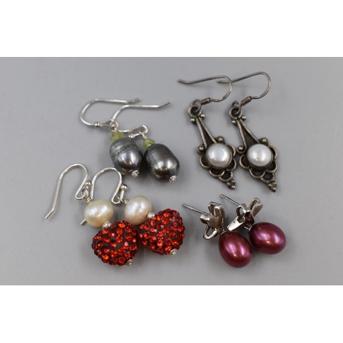 43 - Four Pairs of 925. Silver Pearl Earrings