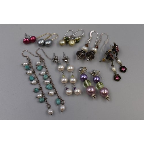 74 - Eight Pairs of Designer Pearl Earrings