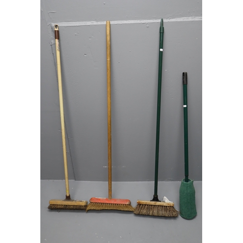 296 - A Large Selection of Various Gardening Equipment. Includes Axe, Brushes, Gloves and More