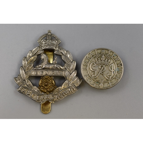 197 - East Lancashire Regiment Cap Badge and a George V For Loyal Service Lapel Badge