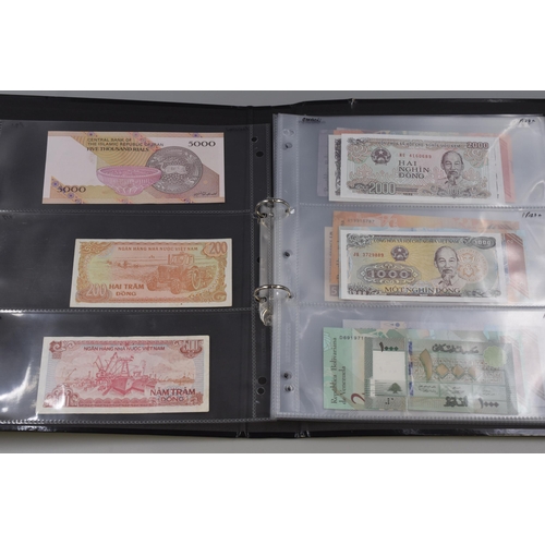 222 - Large Selection of Uncirculated Worldwide Banknotes. Includes Vietnam, Iran, Lebanon, Venezuela, Taj... 