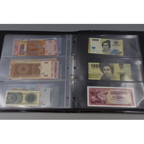 222 - Large Selection of Uncirculated Worldwide Banknotes. Includes Vietnam, Iran, Lebanon, Venezuela, Taj... 