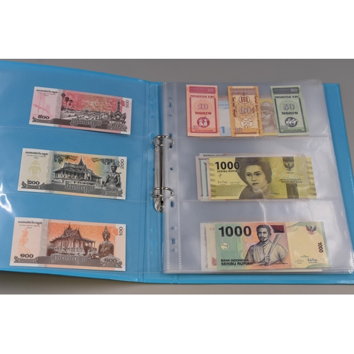 224 - Folder Containing a Large Selection of Uncirculated Worldwide Banknotes. Includes Indonesia, Ukraine... 