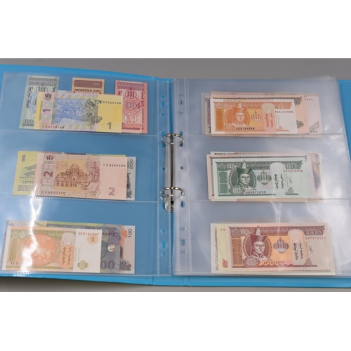 224 - Folder Containing a Large Selection of Uncirculated Worldwide Banknotes. Includes Indonesia, Ukraine... 