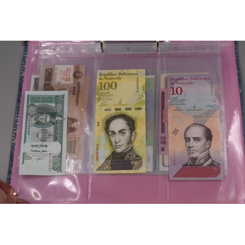 225 - Folder including a Selection of Uncirculated Worldwide Banknotes. Includes Venezuela, North Korea, M... 