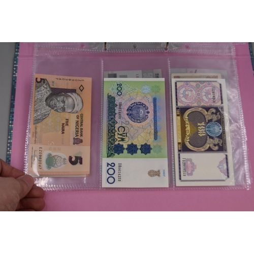 225 - Folder including a Selection of Uncirculated Worldwide Banknotes. Includes Venezuela, North Korea, M... 