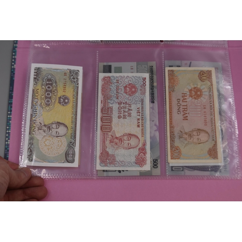 225 - Folder including a Selection of Uncirculated Worldwide Banknotes. Includes Venezuela, North Korea, M... 