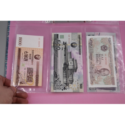 225 - Folder including a Selection of Uncirculated Worldwide Banknotes. Includes Venezuela, North Korea, M... 