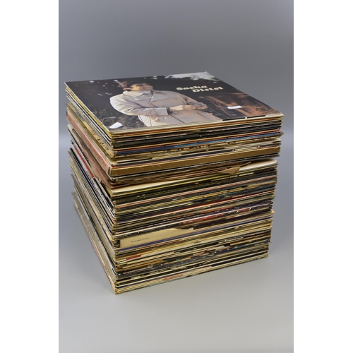 397 - A Large Selection of Vinyl LP's and 78's To Include Sacha Distel, Carpenters, Aretha Franklin, The P... 