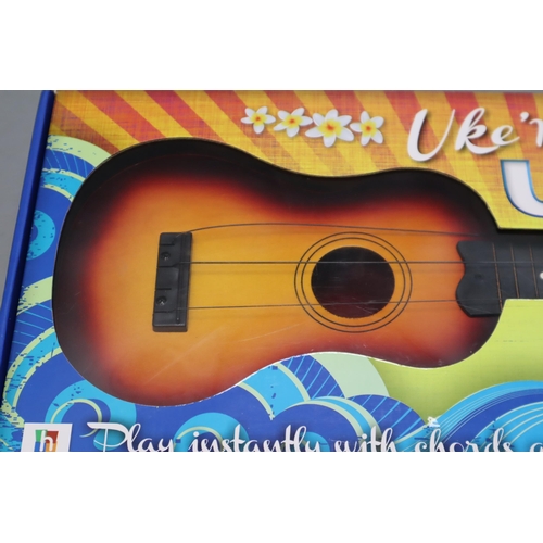 444 - Boxed Uke and Play Ukulele Learn to Play Kit complete with Ukulele, Learning Booklet and Cd Disk. AF