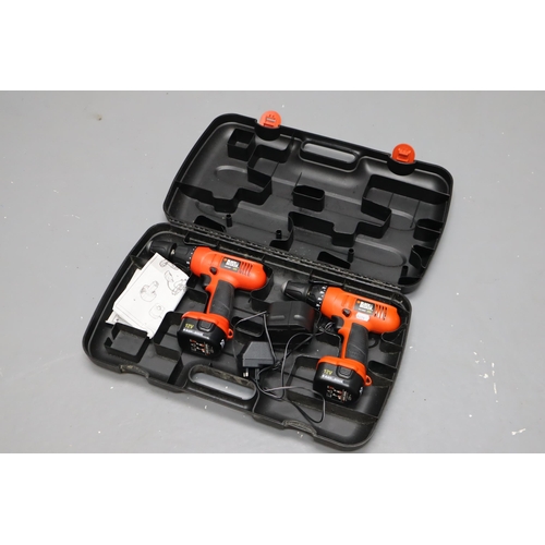 541 - Cased Black and Decker Cordless Twin Drill Set 12v complete with Charger Both Drills power on when t... 