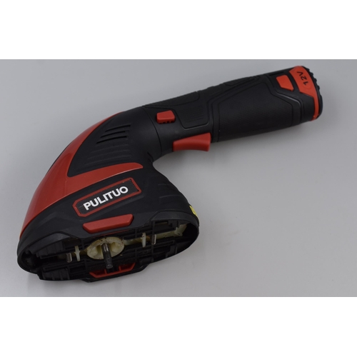 545 - A Boxed Pulituo 12v Cordless Hedge/Grass Trimmer. Includes Grass Shear and Hedge Trimmer Attachment,... 