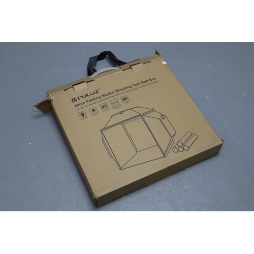 613 - A Puluz 40cm Folding Studio Shooting Tent Soft Box, With Instructions and Four Colours of PVC Backgr... 