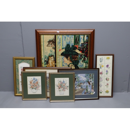 608 - Seven Pieces of Framed Embroidery Artpieces. Includes Four Floral Pieces, Two Cottage Landscapes, An... 