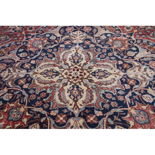 499 - Handwoven Persian Carpet /Rug with Red Ground and Traditional Floral Medallions (4.5mts x 3.5mtrs)