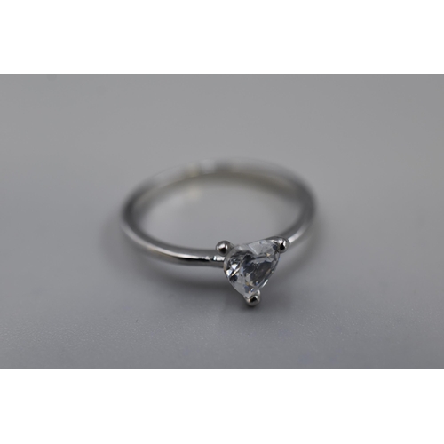 11 - A 925. Silver Clear Loveheart Stoned Ring, Size R. In Presentation Box
